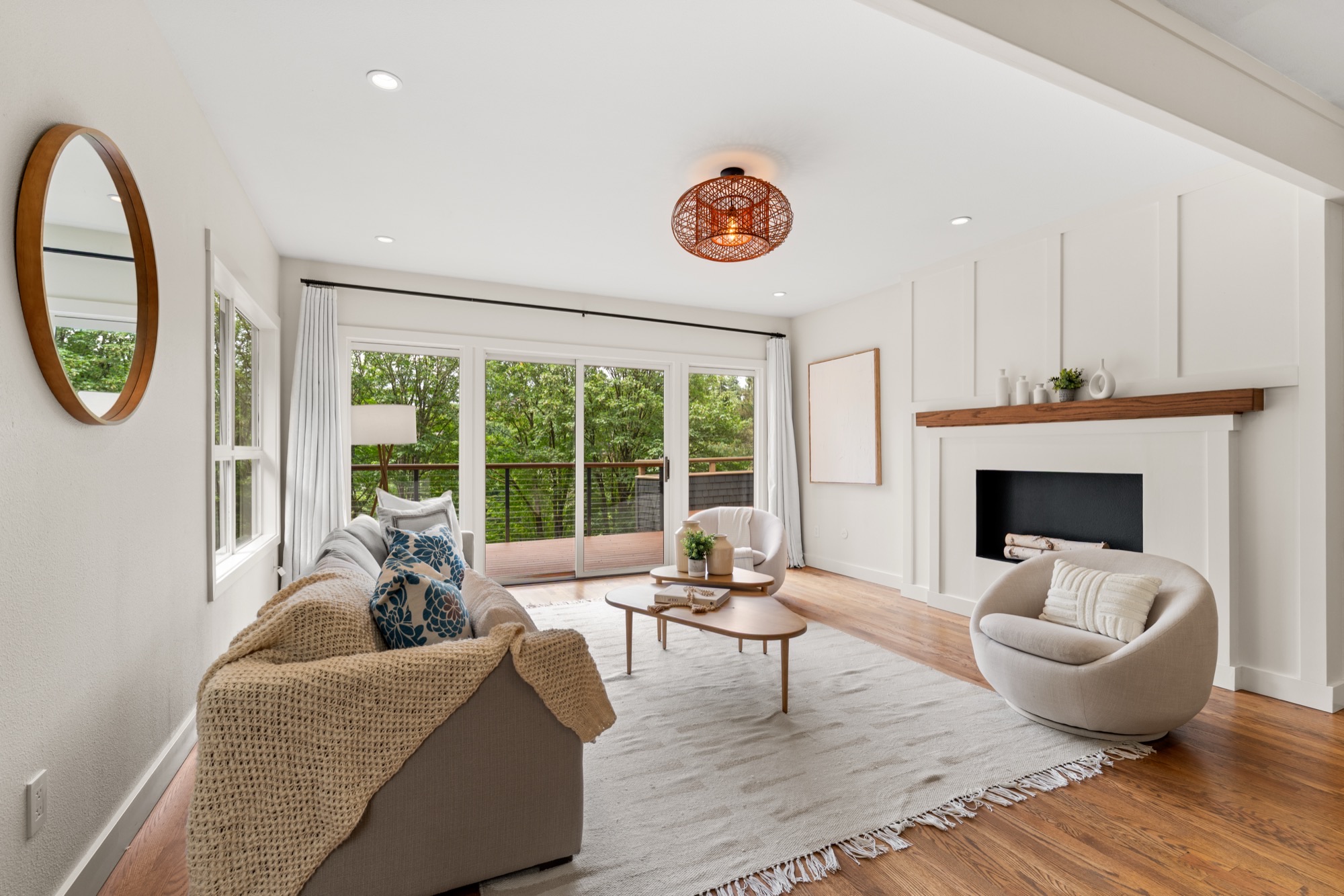 Living room with fireplace and deck access